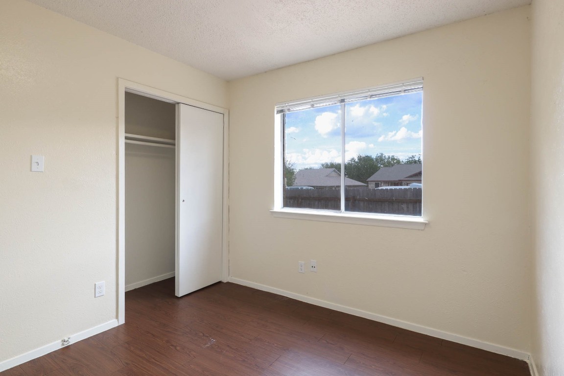 1915 Prairie Knoll Court, Unit B Austin, TX 78758 - Photo 10 of 15 an empty room with a window