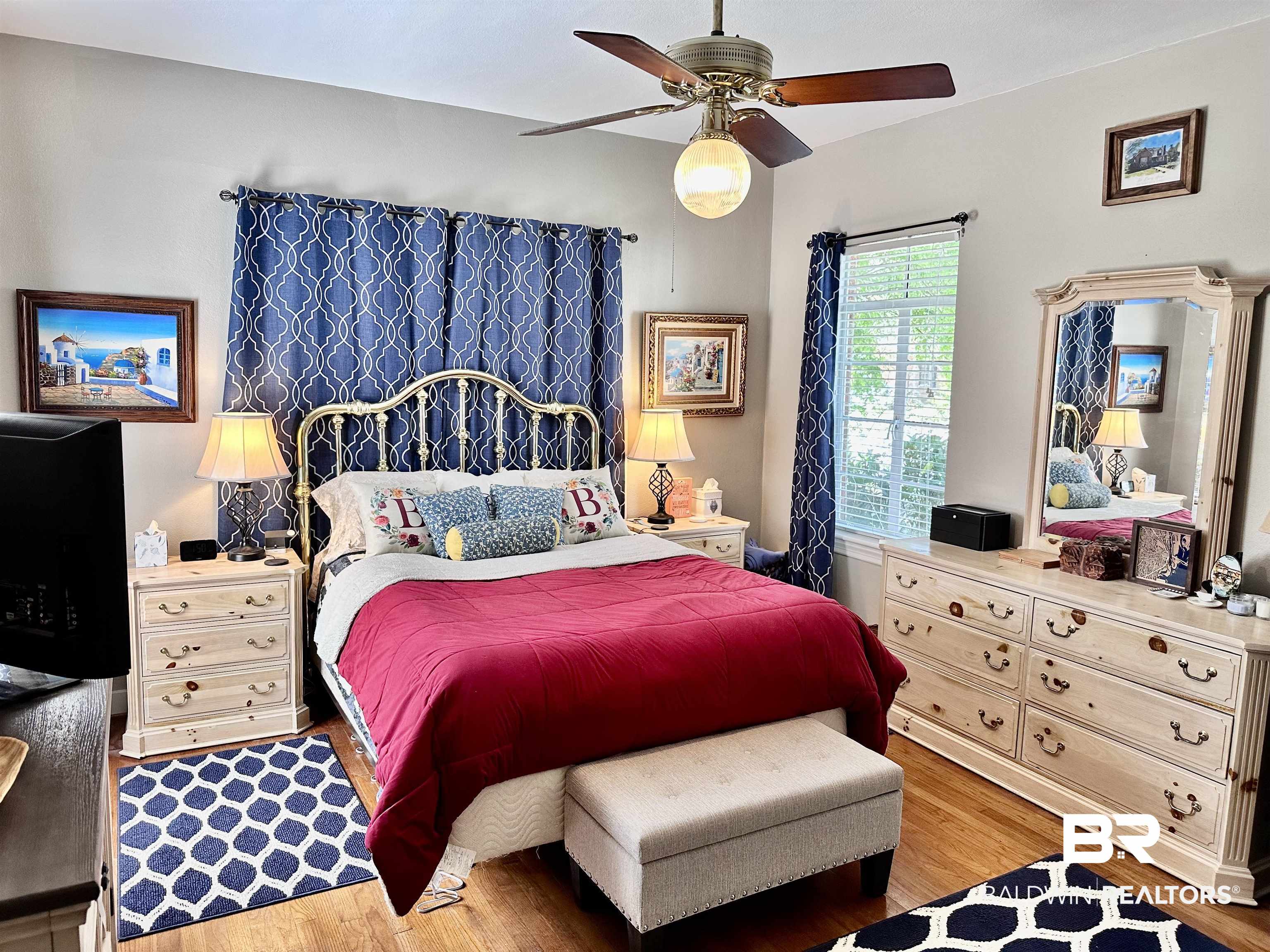 260 Siena Vista Street Mobile, AL 36607 - Photo 8 of 41 Bedroom featuring wood finished floors and ceiling fan