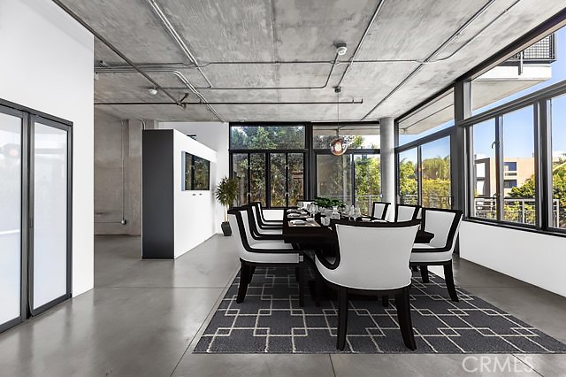 835 Locust Avenue, Unit 322 Long Beach, CA 90813 - Photo 19 of 42 a view of a patio with table and chairs