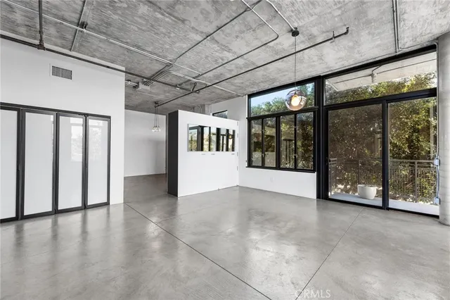 a view of a room with brick walls
