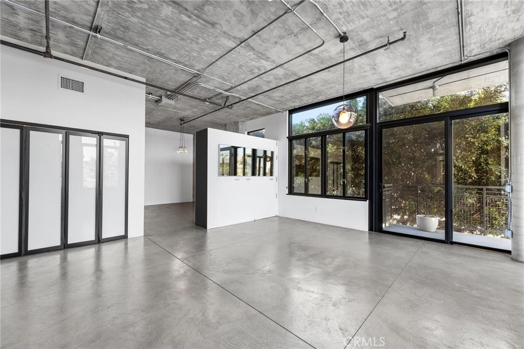 835 Locust Avenue, Unit 322 Long Beach, CA 90813 - Photo 22 of 42 a view of an entryway with wooden floor