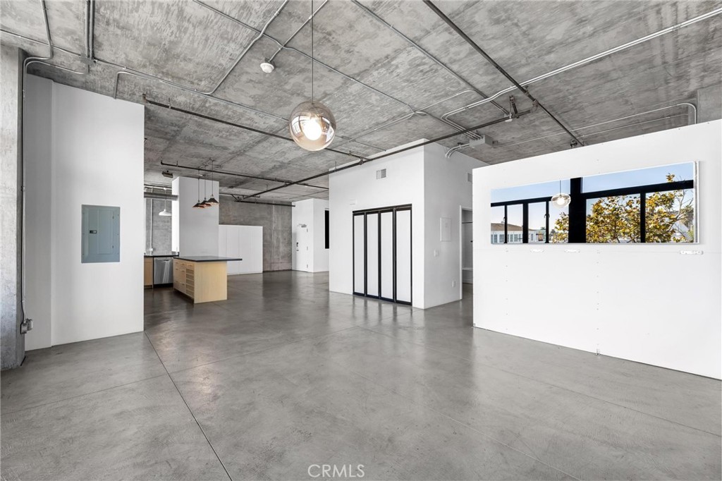 835 Locust Avenue, Unit 322 Long Beach, CA 90813 - Photo 23 of 42 a view of empty room with wooden floor