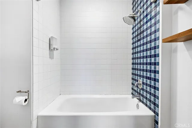 a room with pool table and flat screen tv