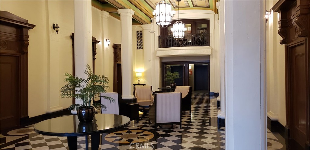 835 Locust Avenue, Unit 322 Long Beach, CA 90813 - Photo 31 of 42 a dining room with furniture window and wooden floor