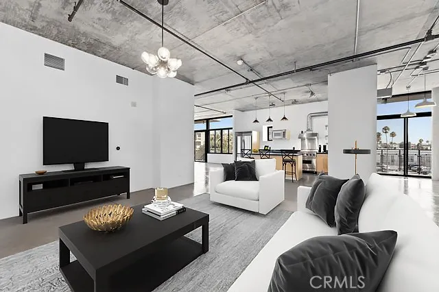 a large white kitchen with a large window