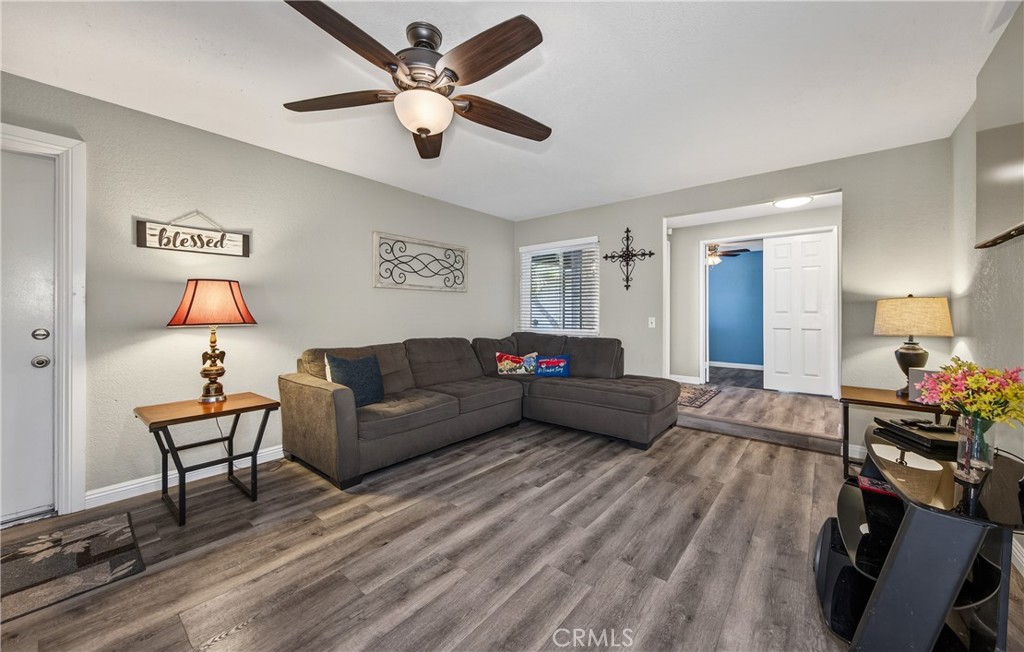 2158 North Magnolia Avenue Rialto, CA 92377 - Photo 5 of 23 a living room with furniture and a wooden floor