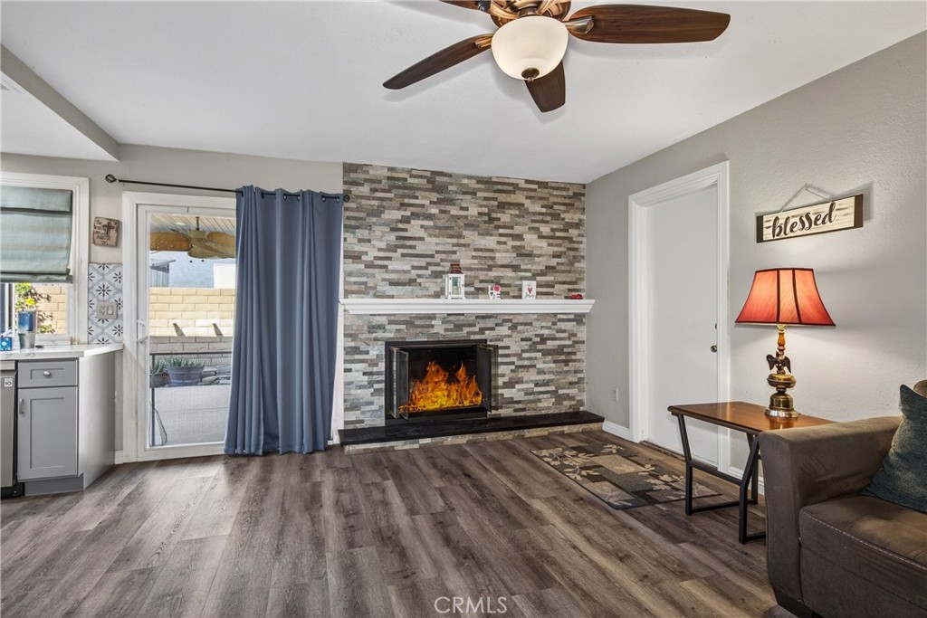 2158 North Magnolia Avenue Rialto, CA 92377 - Photo 6 of 23 a living room with furniture and a fireplace