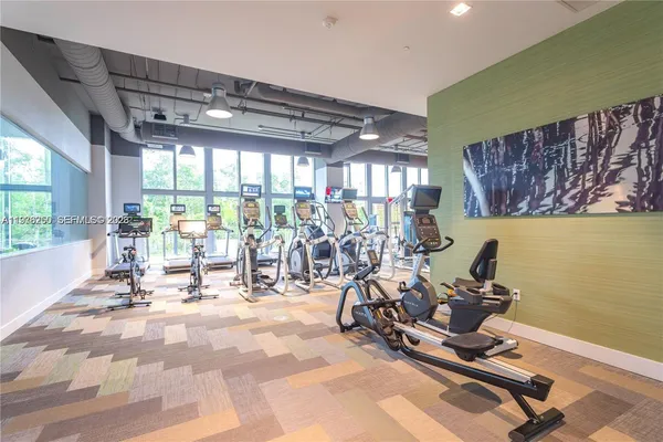 a view of a room with gym equipment