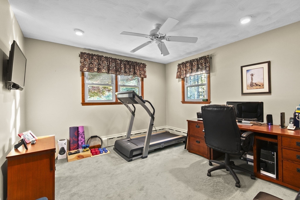 224 Snipatuit Road Rochester, MA 02770 - Photo 13 of 42 a view of a workspace with furniture and a window