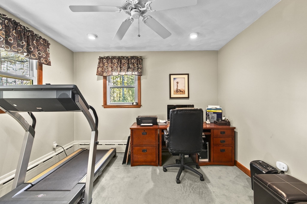 224 Snipatuit Road Rochester, MA 02770 - Photo 15 of 42 a view of a workspace with furniture and a window