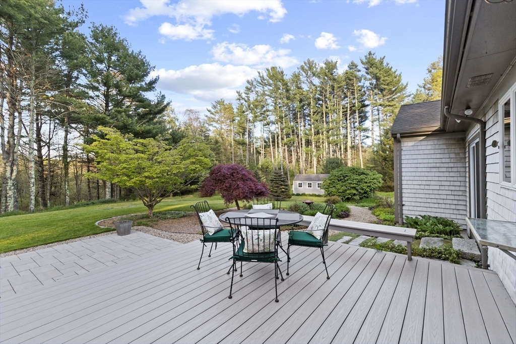 224 Snipatuit Road Rochester, MA 02770 - Photo 2 of 42 a garden view with a seating space