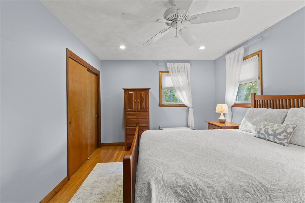 224 Snipatuit Road Rochester, MA 02770 - Photo 24 of 42 a bedroom with a bed and a window