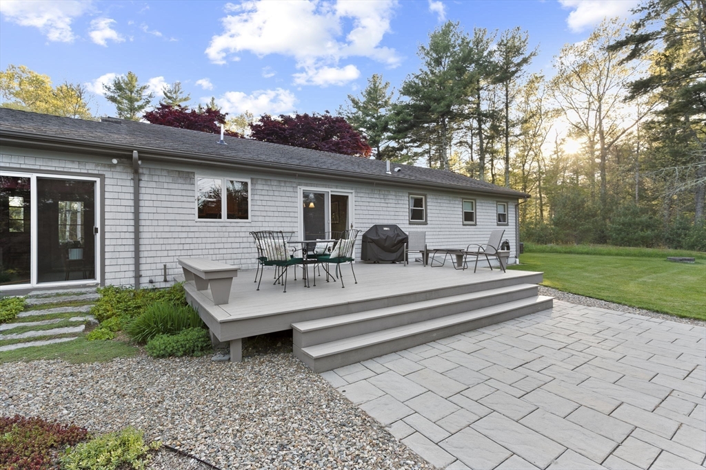 224 Snipatuit Road Rochester, MA 02770 - Photo 3 of 42 a view of a white house with a big yard and potted plants