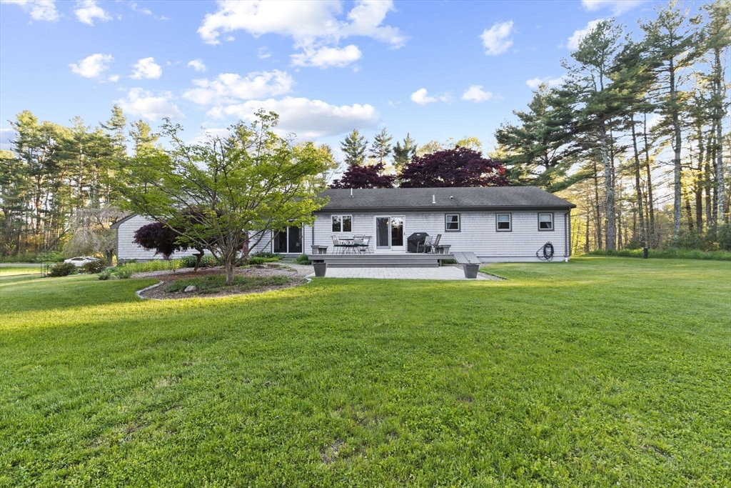 224 Snipatuit Road Rochester, MA 02770 - Photo 38 of 42 a front view of house with yard and outdoor seating