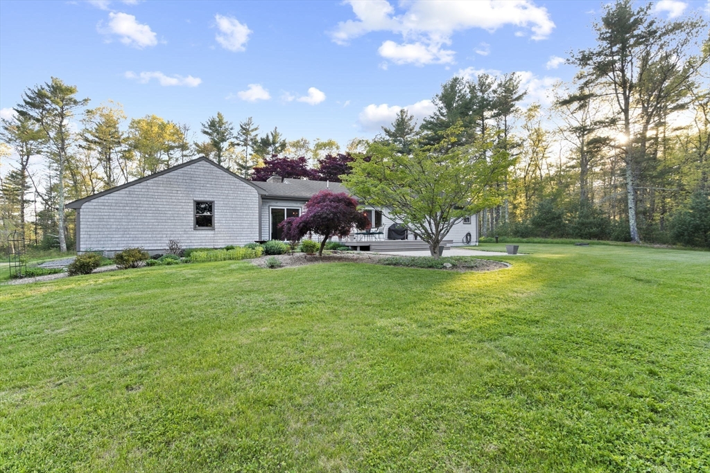 224 Snipatuit Road Rochester, MA 02770 - Photo 39 of 42 a house view with a garden space