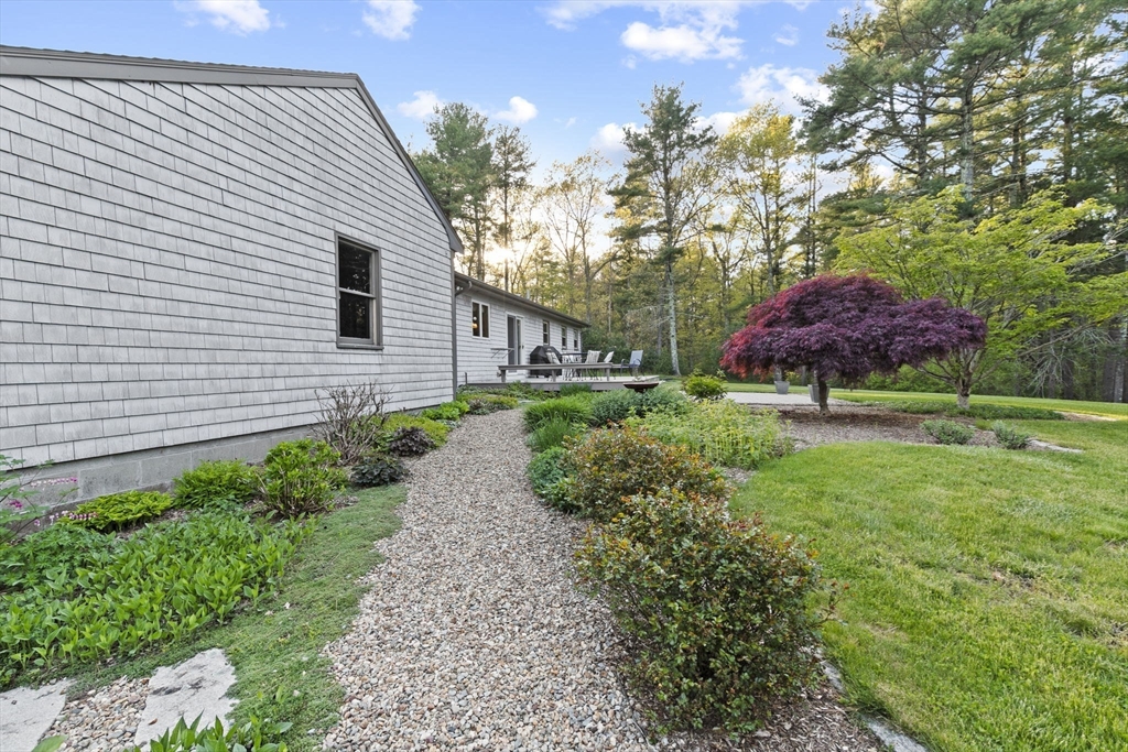 224 Snipatuit Road Rochester, MA 02770 - Photo 40 of 42 a view of a house with a yard