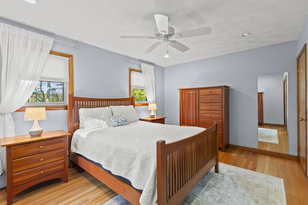 224 Snipatuit Road Rochester, MA 02770 - Photo 9 of 42 a bedroom with a bed and a dresser