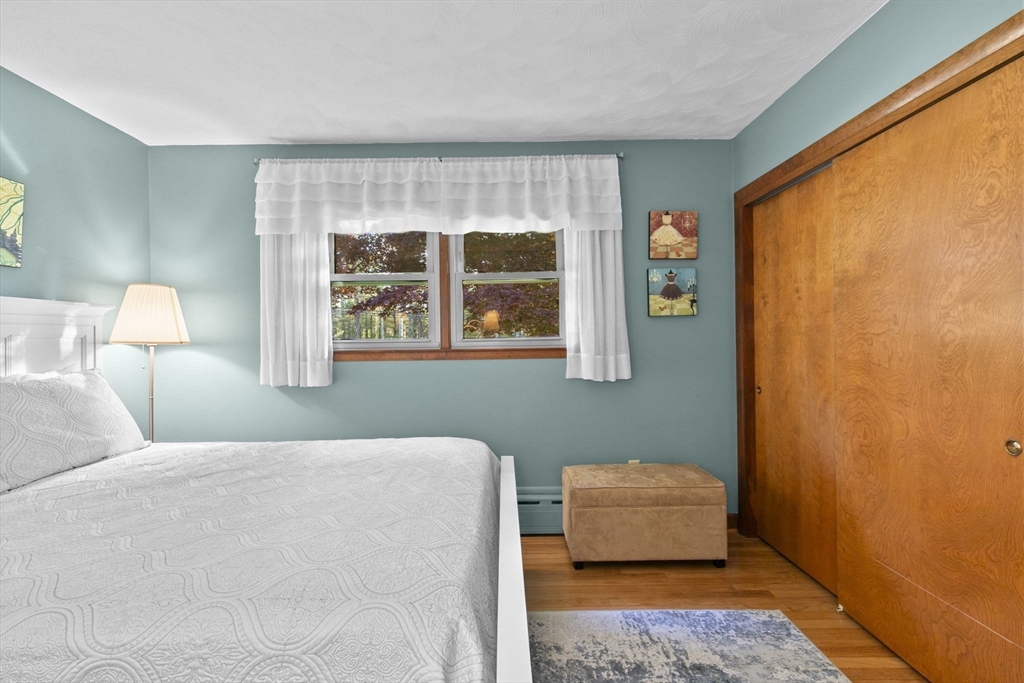 224 Snipatuit Road Rochester, MA 02770 - Photo 10 of 42 a bedroom with a bed and a window