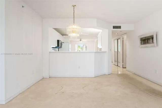 a view of a kitchen with a sink