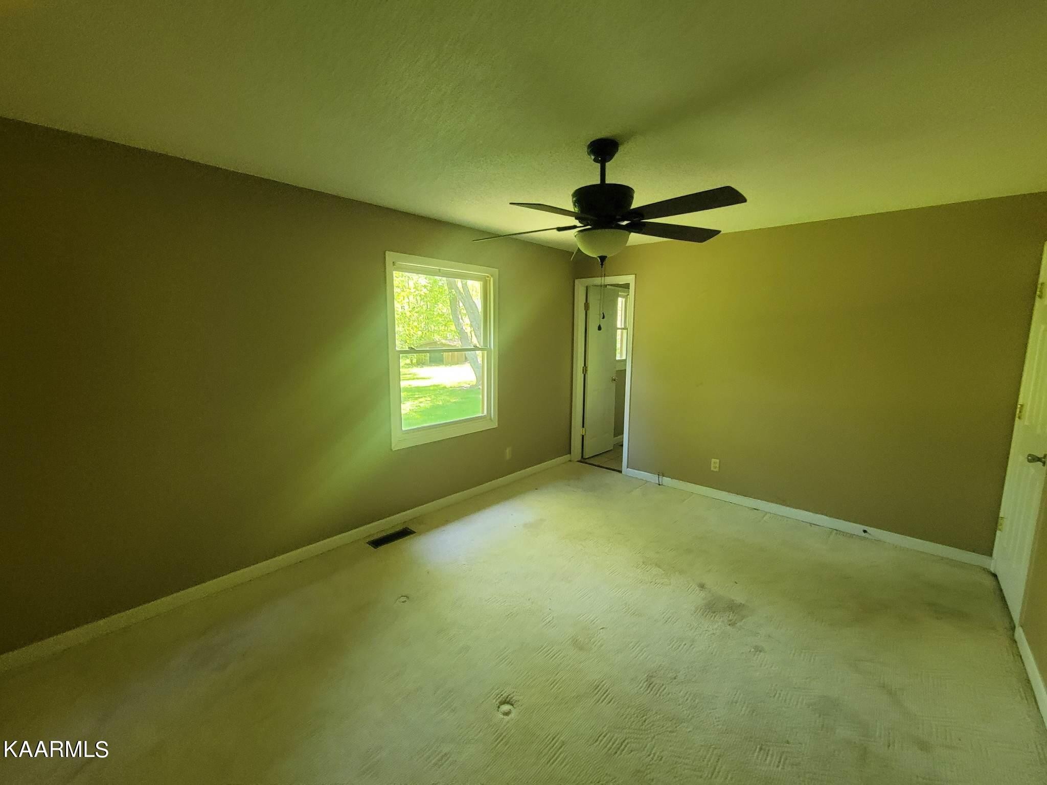 1054 Franklin Loop Clarkrange, TN 38553 - Photo 11 of 35 a view of an empty room with a window
