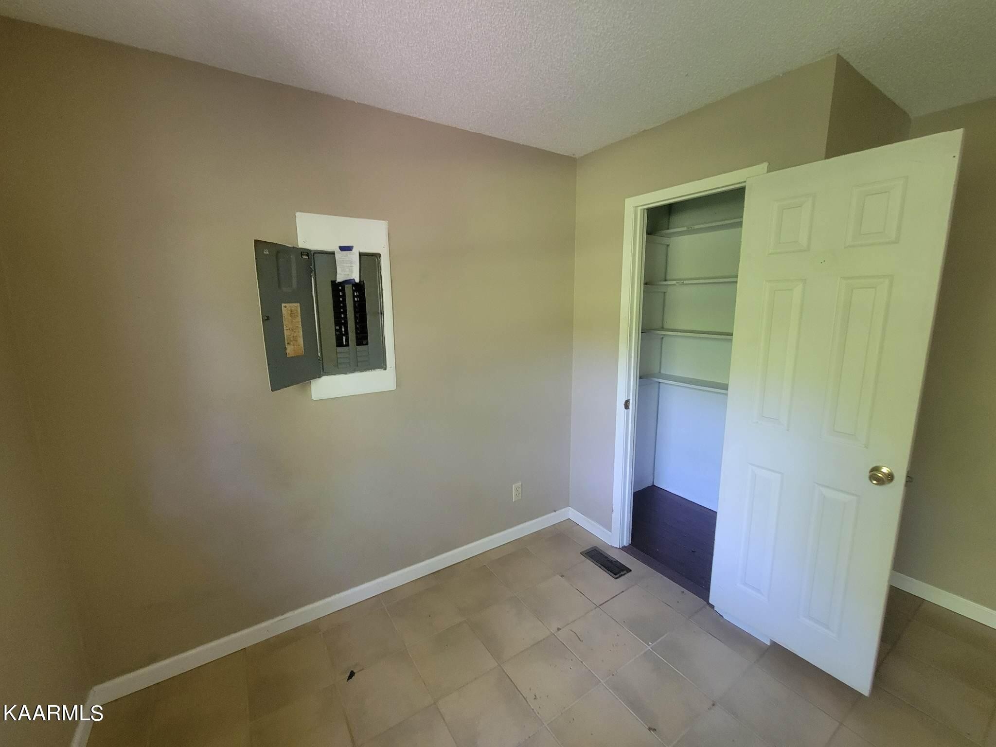 1054 Franklin Loop Clarkrange, TN 38553 - Photo 18 of 35 an empty room with windows