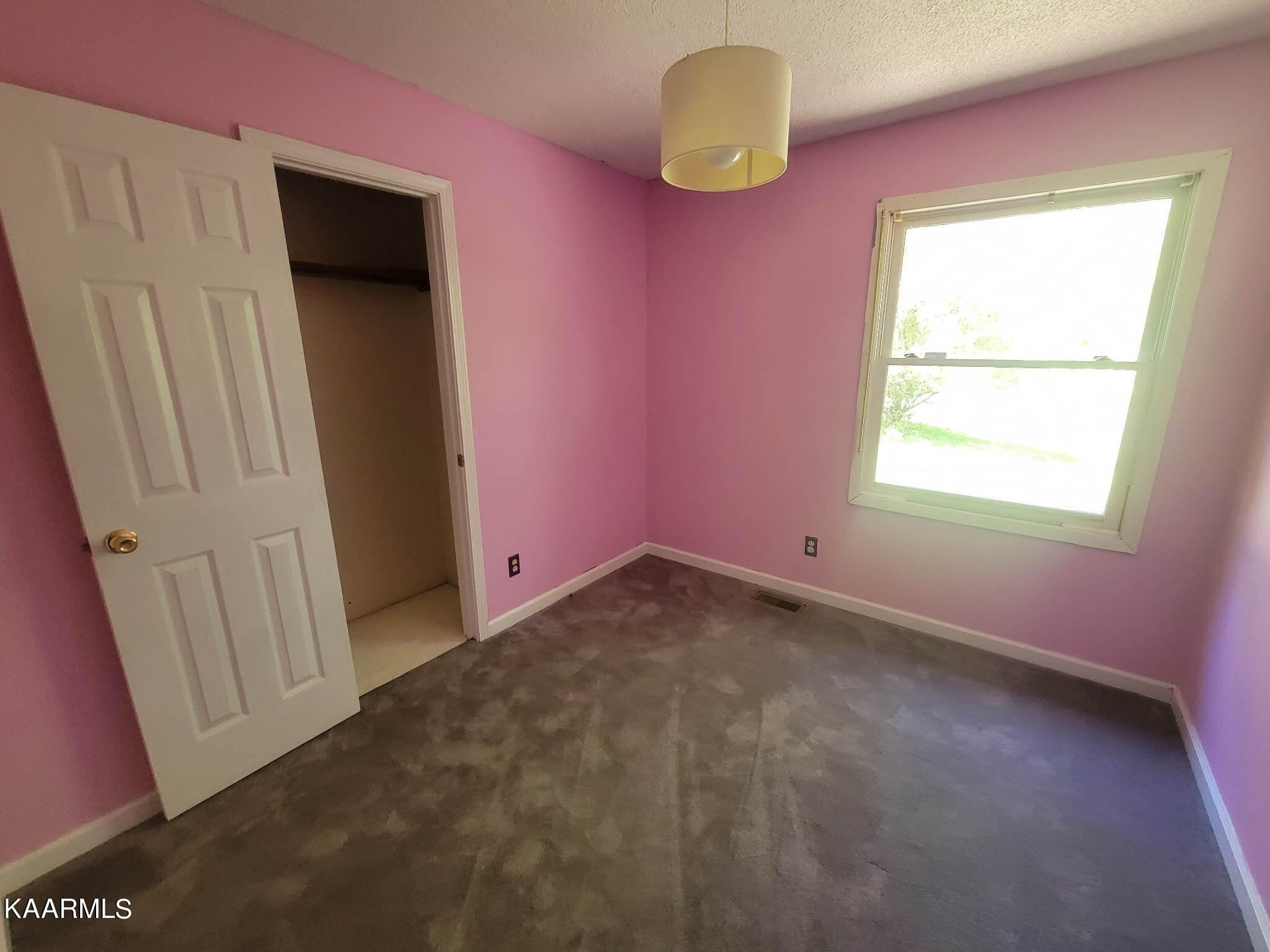 1054 Franklin Loop Clarkrange, TN 38553 - Photo 21 of 35 a view of empty room with window