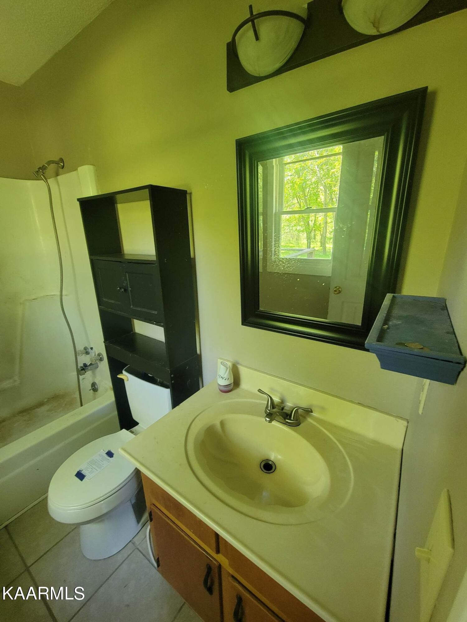 1054 Franklin Loop Clarkrange, TN 38553 - Photo 24 of 35 a bathroom with a sink and a mirror