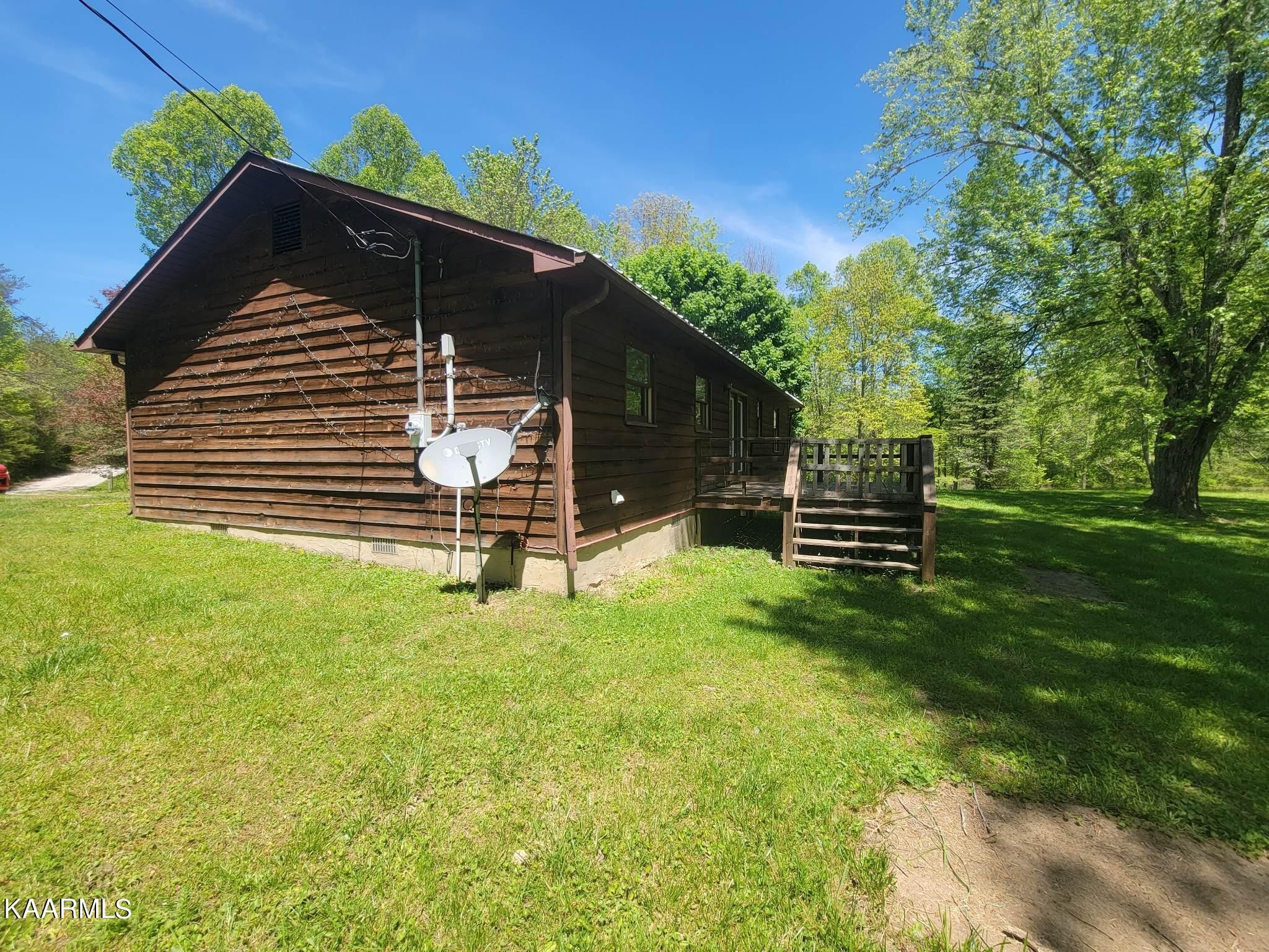 1054 Franklin Loop Clarkrange, TN 38553 - Photo 4 of 35 a house view with a garden space