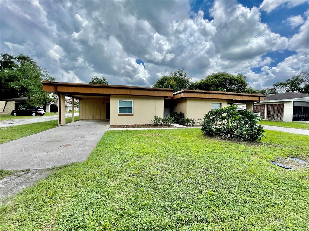 211 Stefanik Road Winter Park, FL 32792 - Photo 2 of 19 a front view of house with yard and green space