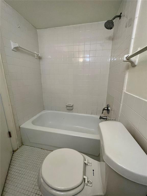 211 Stefanik Road Winter Park, FL 32792 - Photo 10 of 19 a white toilet sitting next to a bath tub
