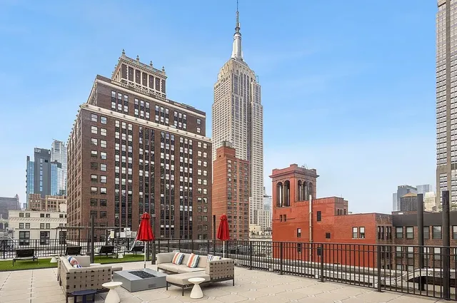 a view of a city with tall buildings