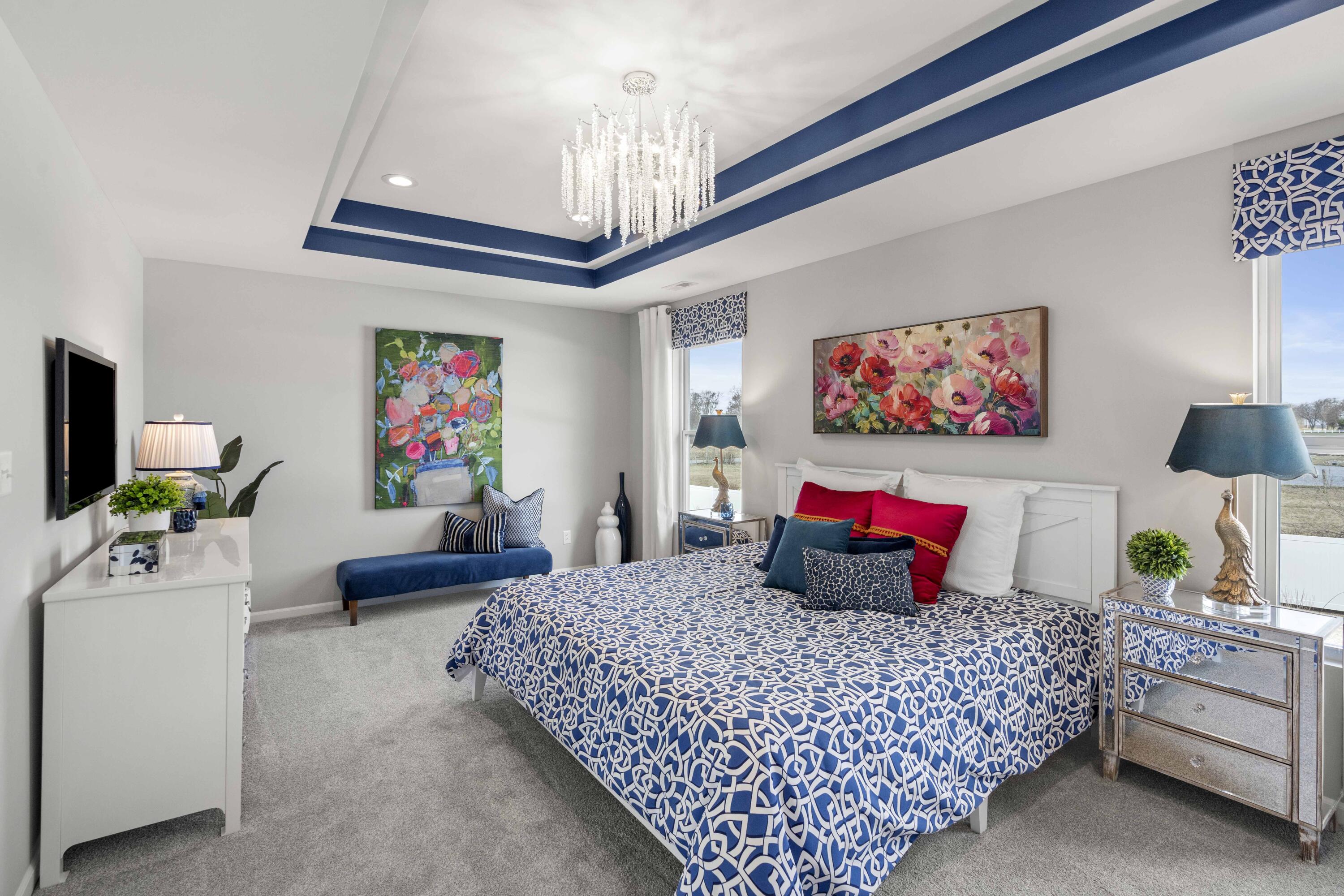 6754 East 103rd Avenue Crown Point, IN 46307 - Photo 12 of 17 a bedroom with a bed and ceiling fan