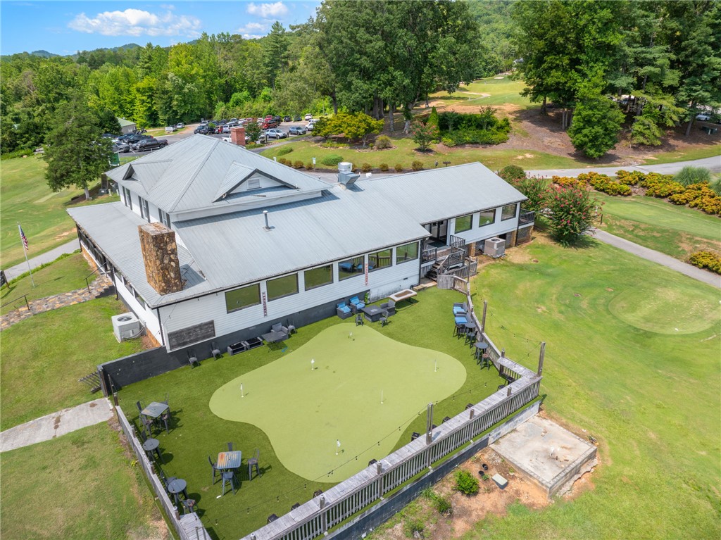 300 Whispering Falls Road Pickens, SC 29671 - Photo 33 of 41 An aerial perspective showcases a metal roof and a dedicated putting green in the yard.