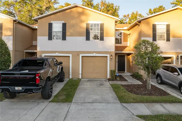 a car parked in front of a house