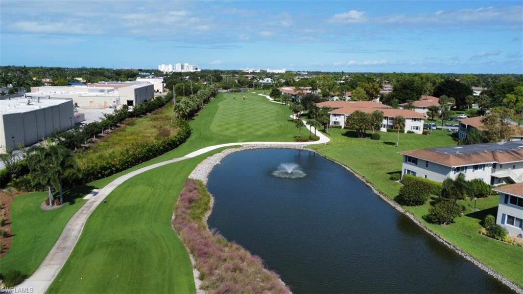 801 Teryl Road, Unit 4 Naples, FL 34112 - Photo 15 of 19 Drone / aerial view of 6th hole on the Pines golf course