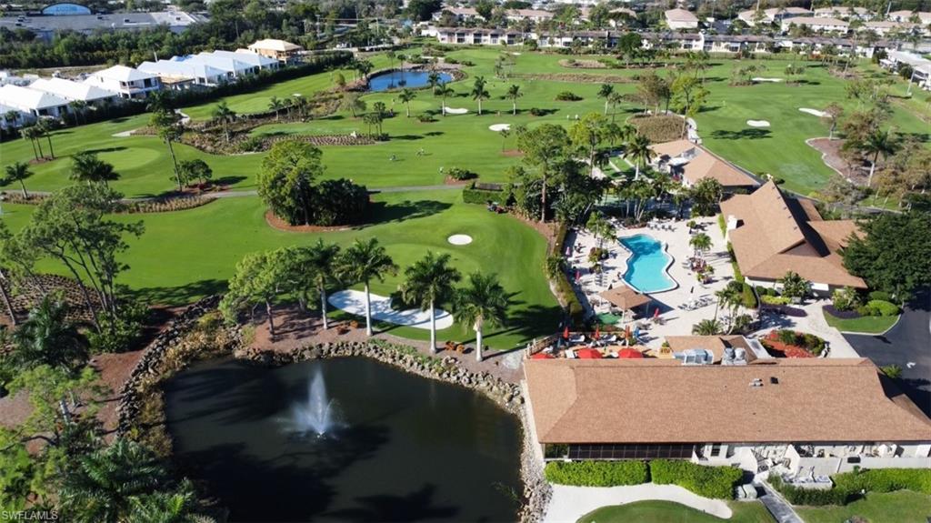 801 Teryl Road, Unit 4 Naples, FL 34112 - Photo 19 of 19 Aerial view of the 19th hole restaurant, main pool, clubhouse and Palmetto golf course.