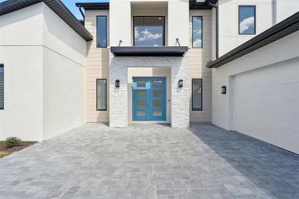 a view of empty room with windows