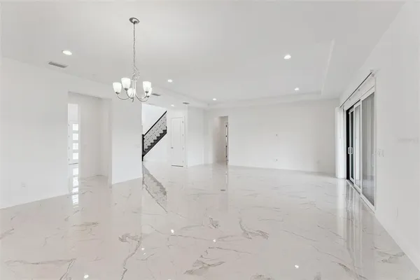 a view of a chandelier and entryway