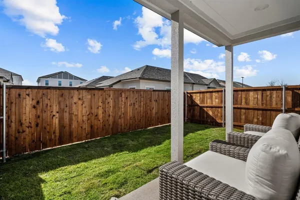 a view of a porch with a backyard