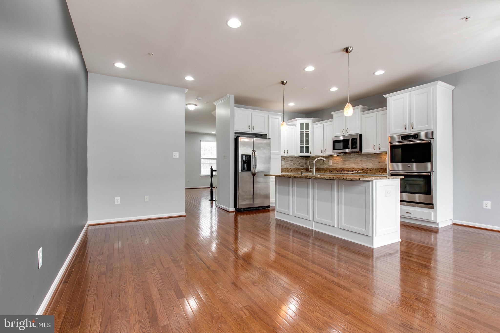 7926 Silver Oak Road Hanover, MD 21076 - Photo 12 of 44 a view of kitchen with cabinets and stainless steel appliances