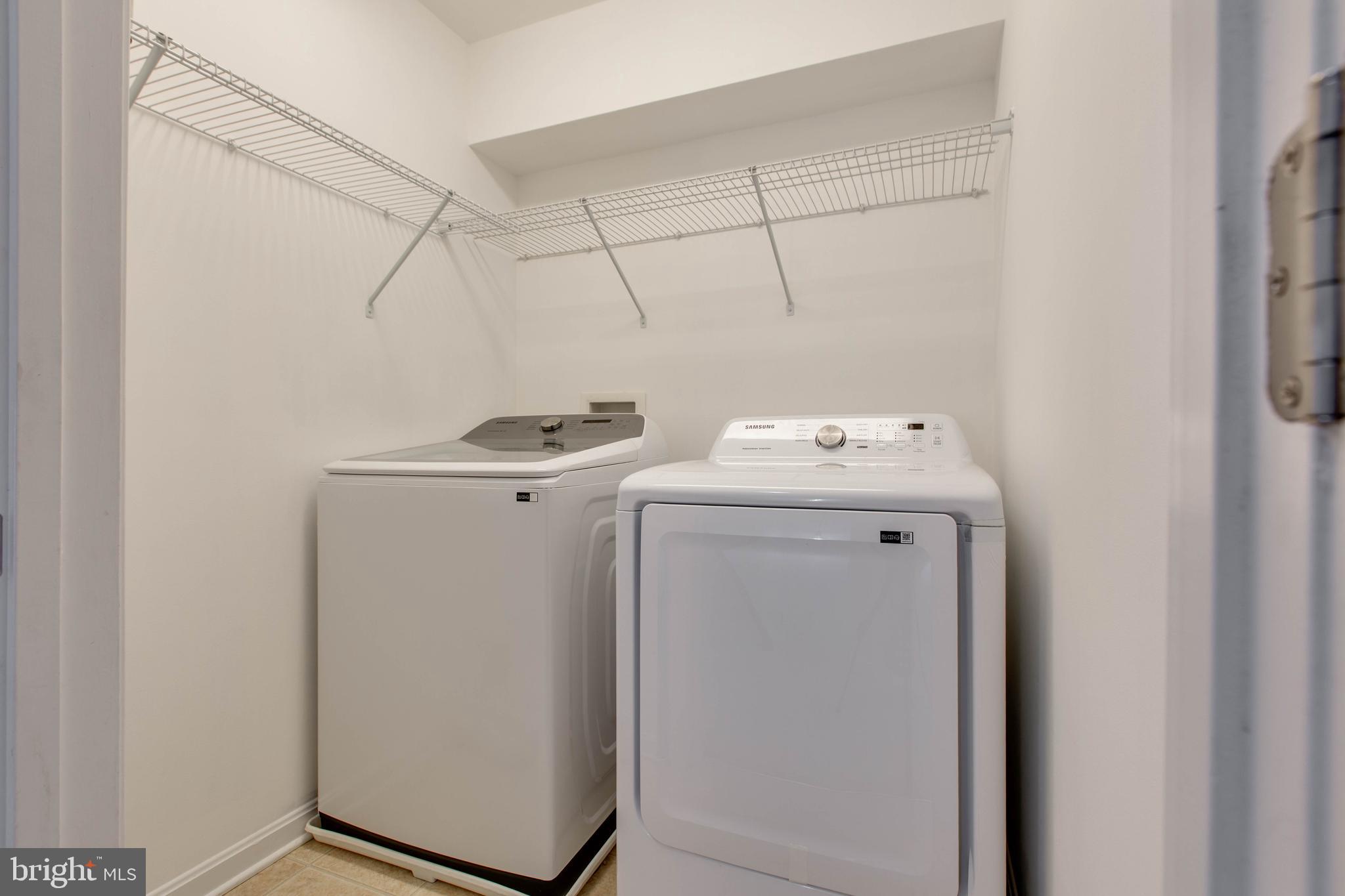 7926 Silver Oak Road Hanover, MD 21076 - Photo 37 of 44 a utility room with dryer and washer