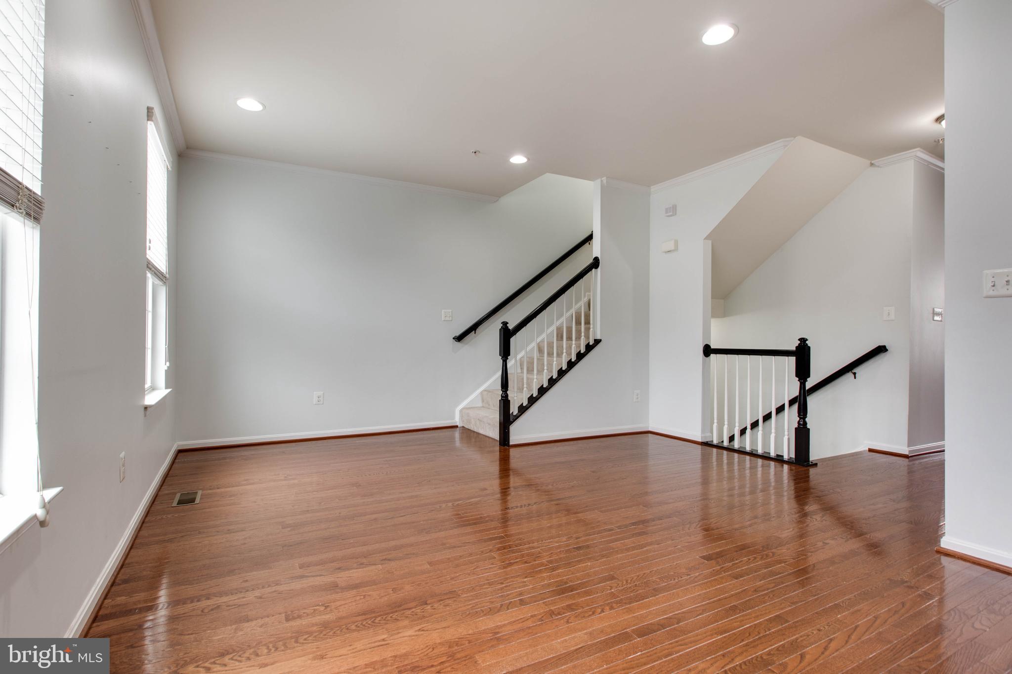 7926 Silver Oak Road Hanover, MD 21076 - Photo 9 of 44 a view of entryway with wooden floor