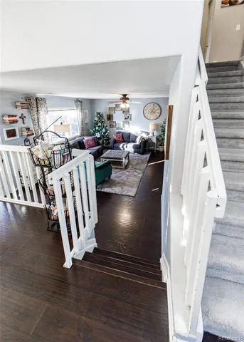 a view of living room with furniture and rug