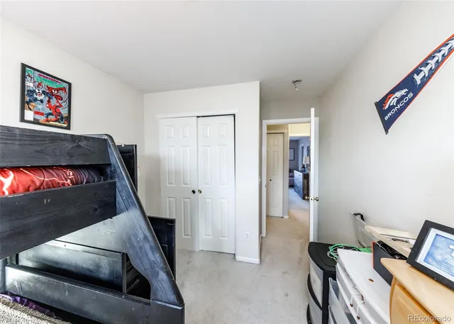 a view of a livingroom with furniture and a flat screen tv