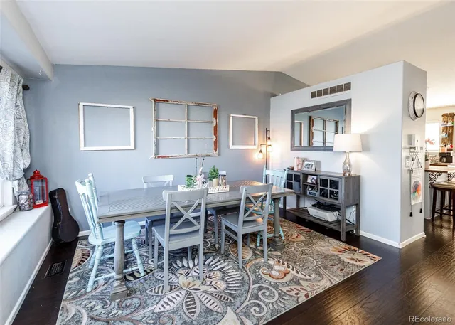 a view of a dining room with furniture