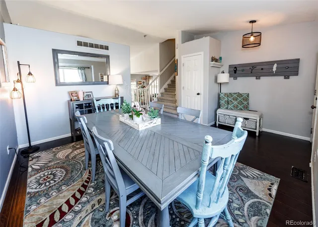 a view of a dining room with furniture