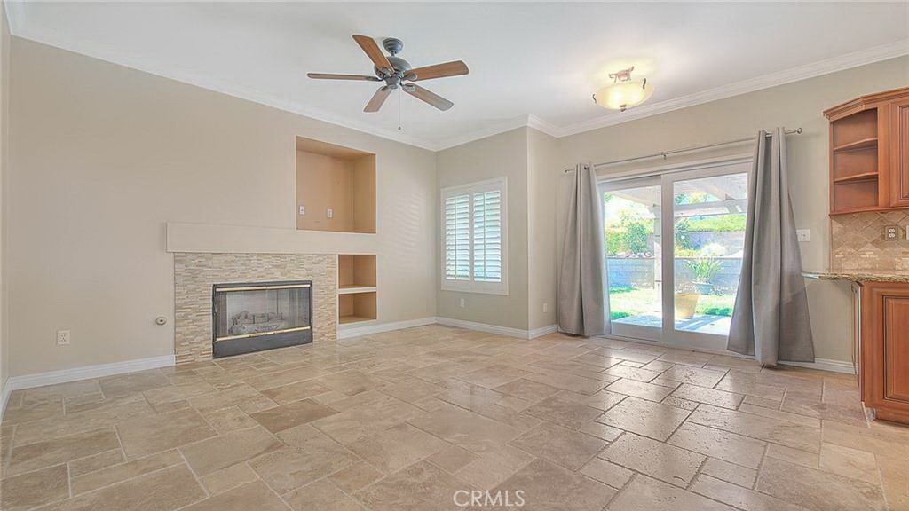 16410 Argent Road Chino Hills, CA 91709 - Photo 14 of 31 a view of an empty room with a fireplace and a window