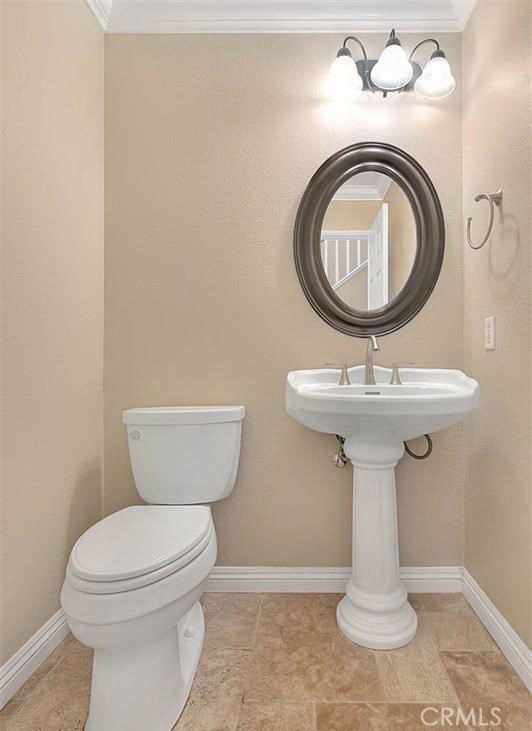 16410 Argent Road Chino Hills, CA 91709 - Photo 31 of 31 a bathroom with a sink toilet and a mirror