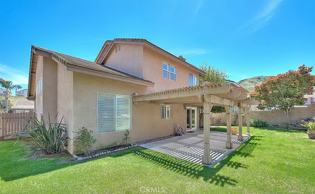 16410 Argent Road Chino Hills, CA 91709 - Photo 10 of 31 a front view of a house with a yard and porch