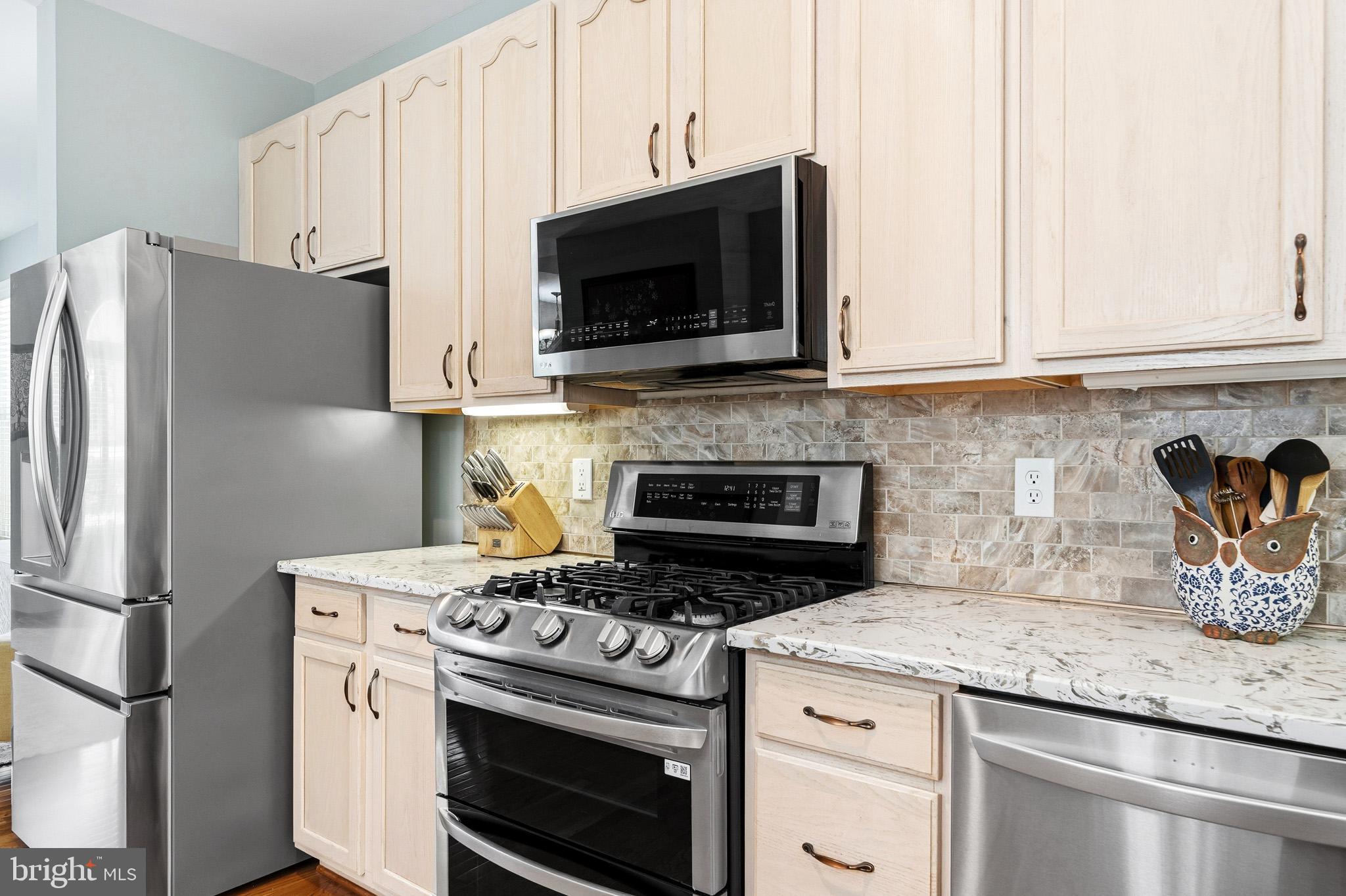 3148 Holland Cliffs Road Huntingtown, MD 20639 - Photo 16 of 61 Modern stainless steel appliances.